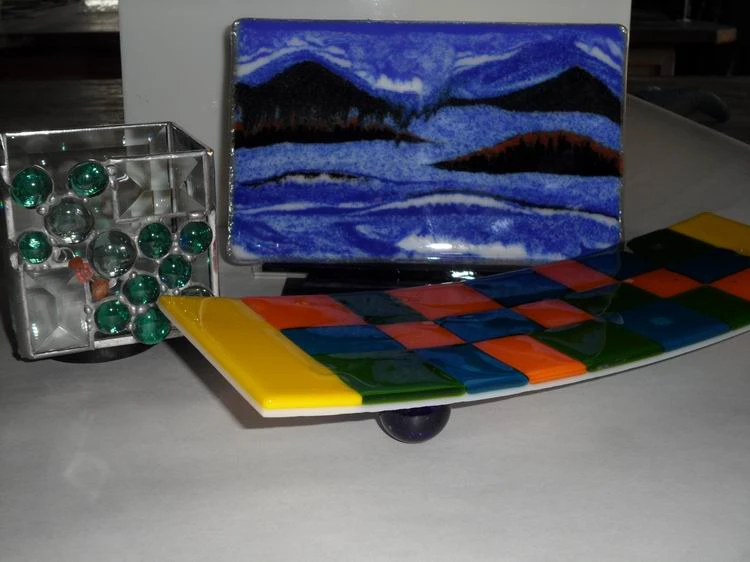 Colourful fused and patterned glass pieces in the studio gallery