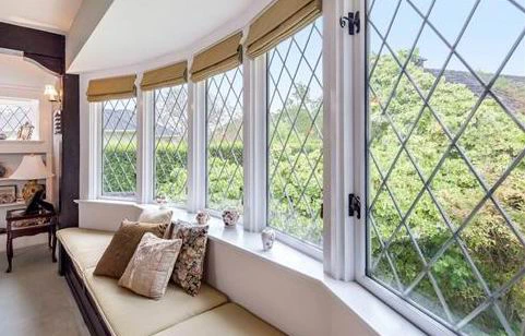 Bright sitting room with leaded windows